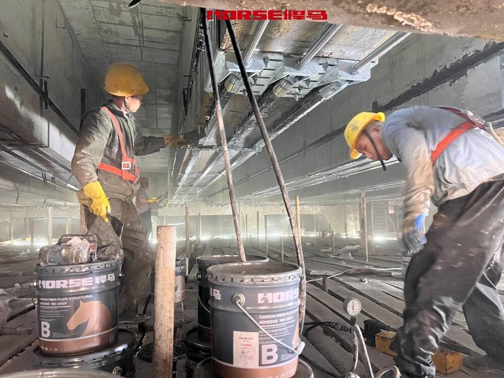 Prestressed Carbon Plates for Girder Bridge