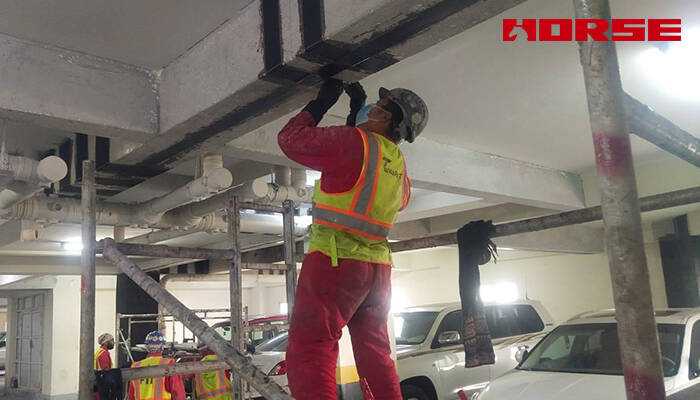 Structural Rehabilitation and Load Upgrading of Parking Structures Using Carbon Fiber 